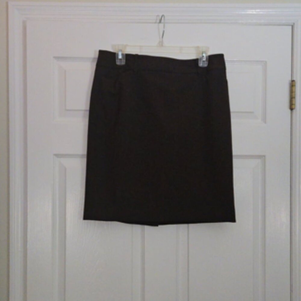 Ladies black skirt.  Polyester, spandex and rayon material